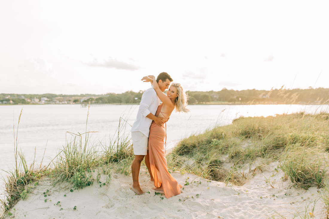 Carolina Beach engagement photos by Wilmington Wedding photographer on a boat at a beach 