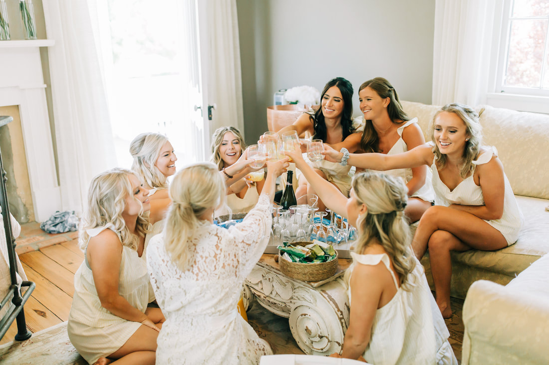 Cloverleaf farm wedding photographer bridesmaids toast cheersing