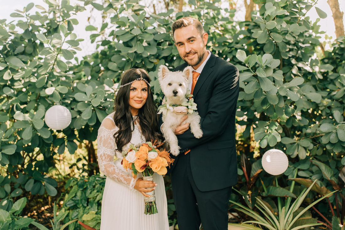 Miami wedding photographer backyard wedding boho decor with the dog