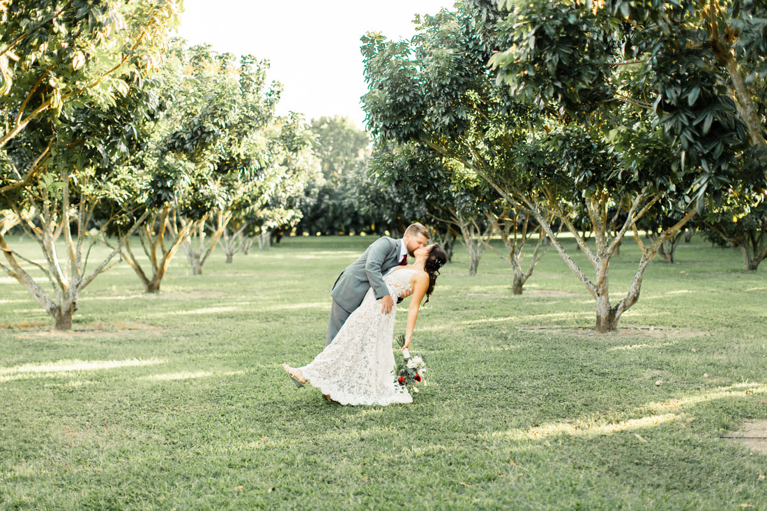Raleigh Wedding Photographer Mattheson Hammock Park| Logans Place wedding Miami Wedding light and airy candid couple's pictures