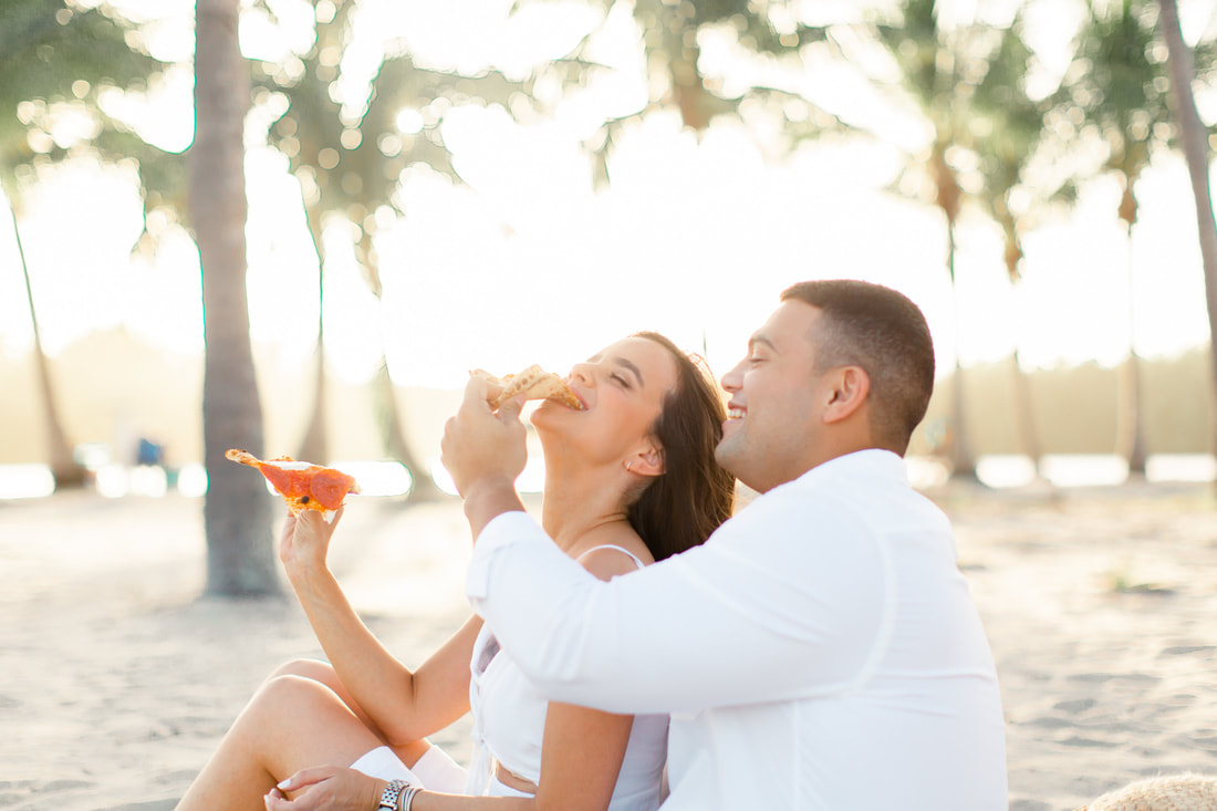Raleigh wedding photographer Miami pizza picnic beach engagement champagne 