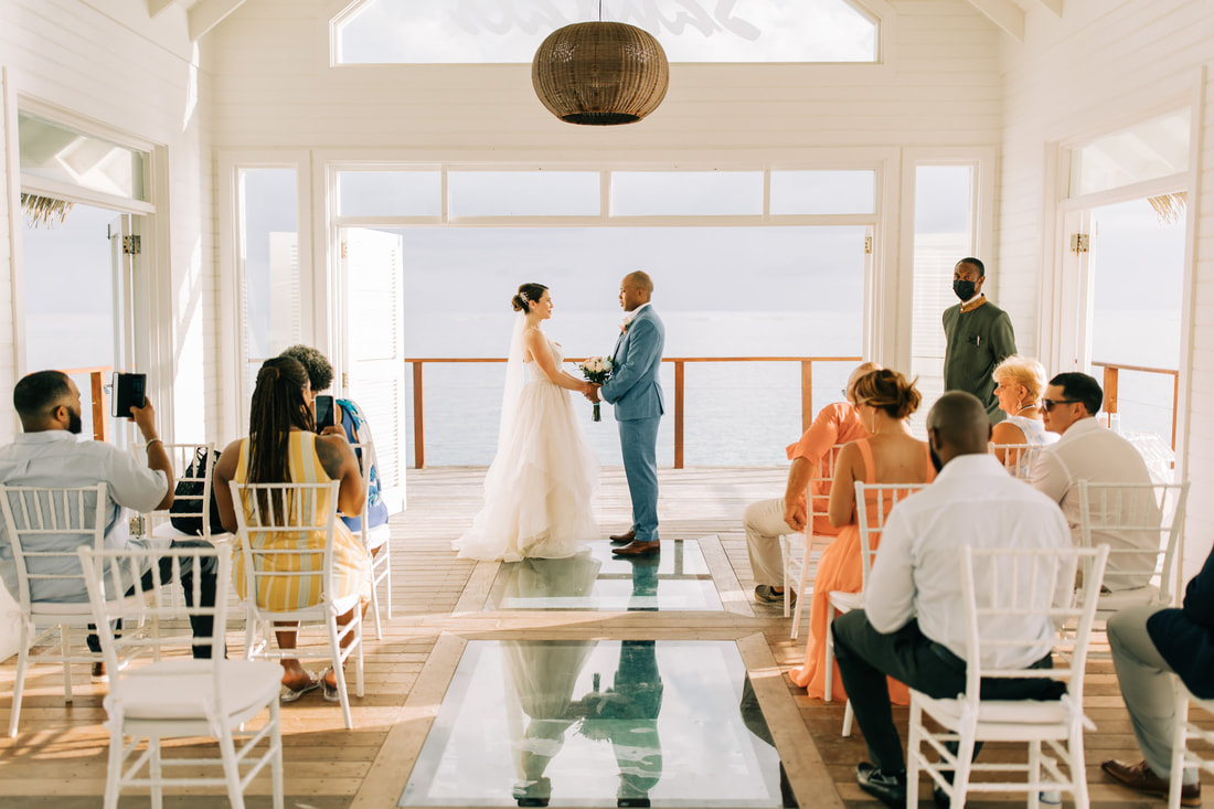 Wedding ceremony at Sandals South Coast Jamaica in the overwater chapel