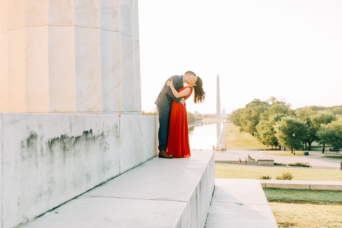Lincoln Memorial engagement photos at sunrise in Washington DC wedding photographer dip kiss